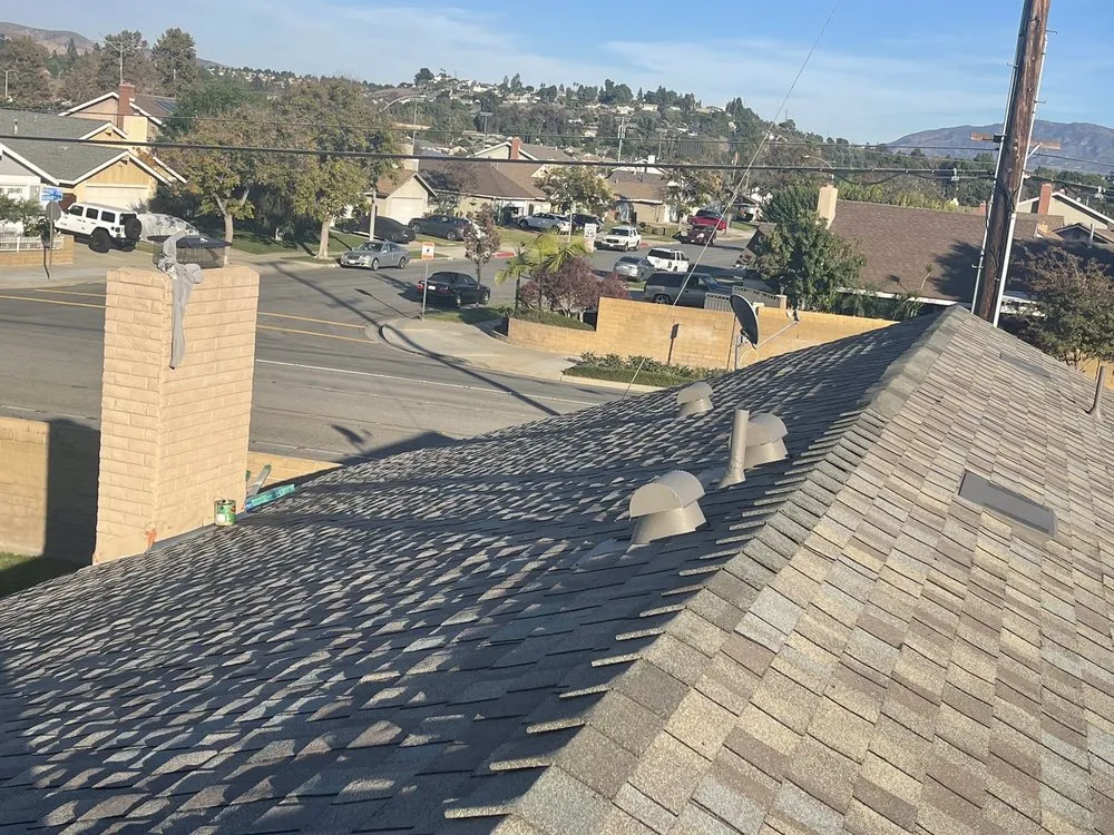 Slide of Rudy’s roofing