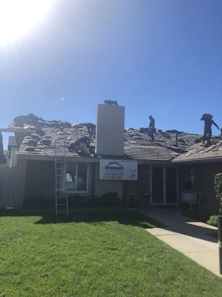 Slide of Rudy’s roofing