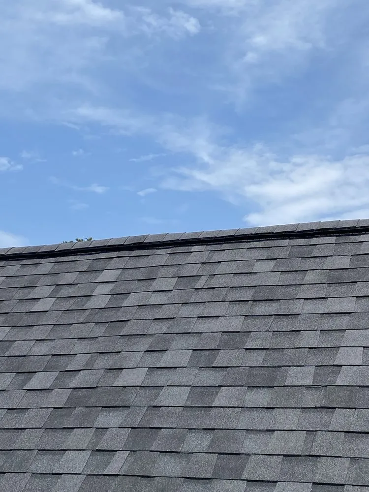 Slide of Ruebens Roofing