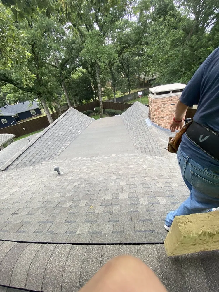 Slide of Ruebens Roofing