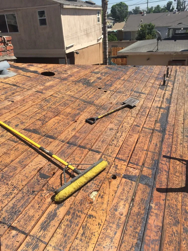 Slide of Ruiz Roofing Construction