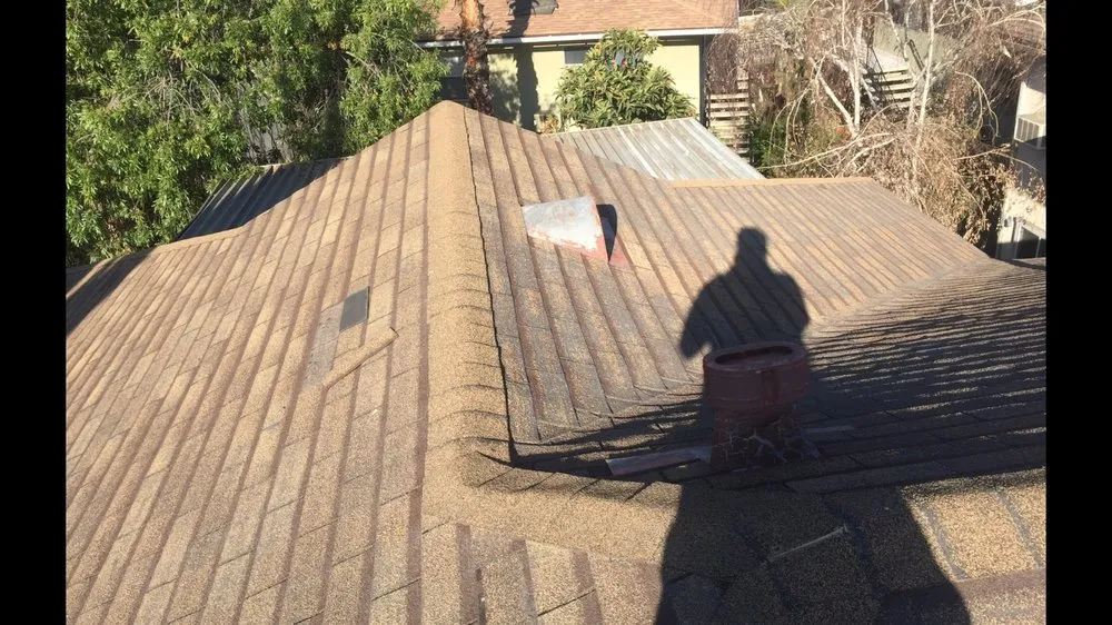 Slide of Ruiz Roofing Construction