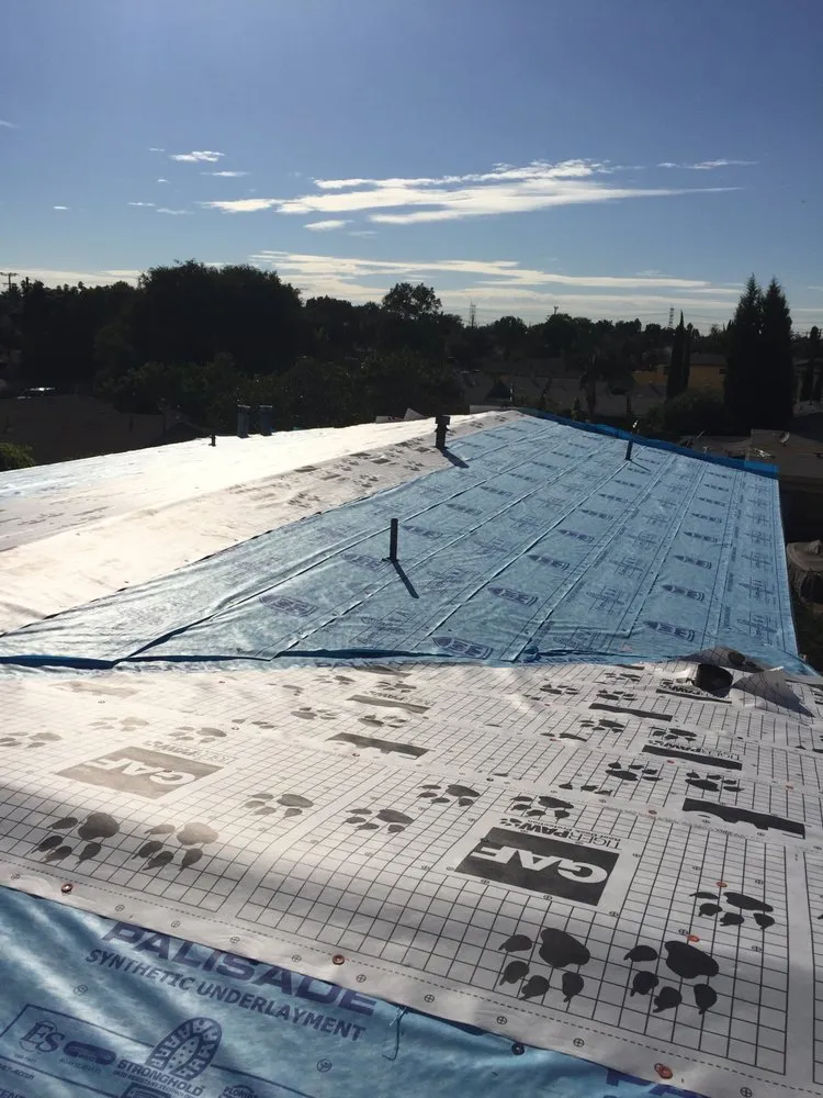 Slide of Ruiz Roofing Construction