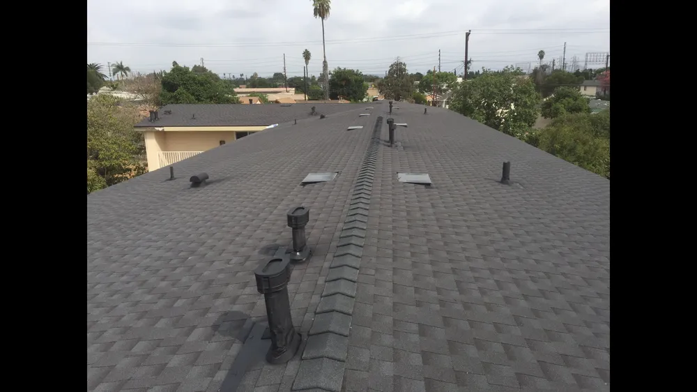 Slide of Ruiz Roofing Construction