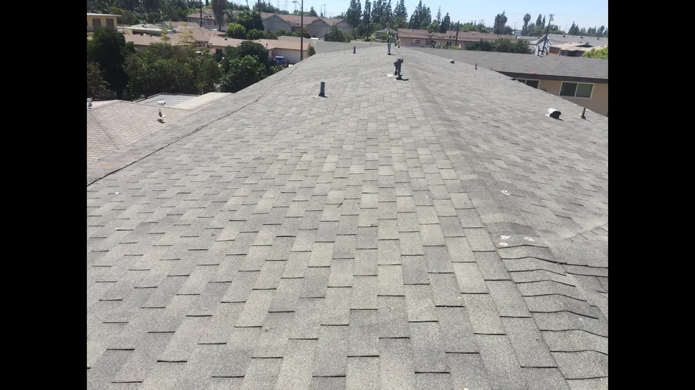 Slide of Ruiz Roofing Construction