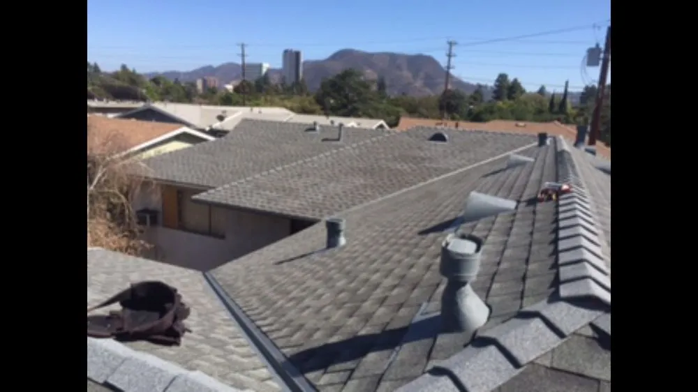 Slide of Ruiz Roofing Construction