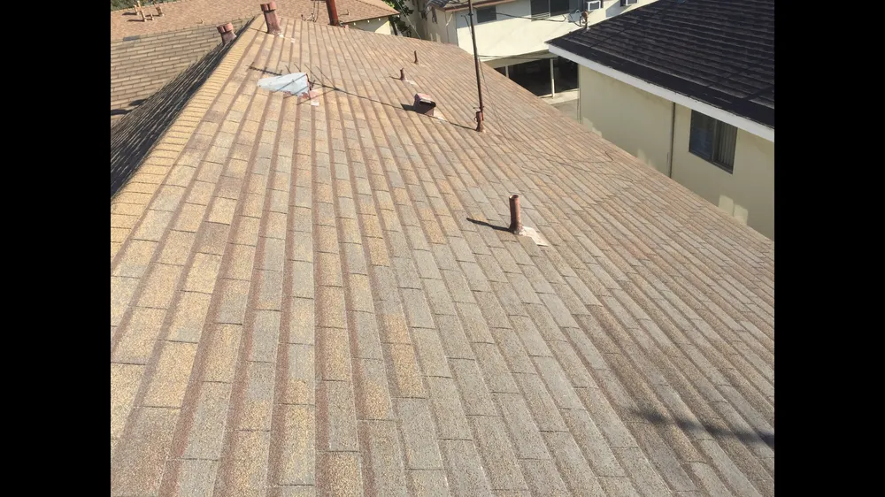 Slide of Ruiz Roofing Construction