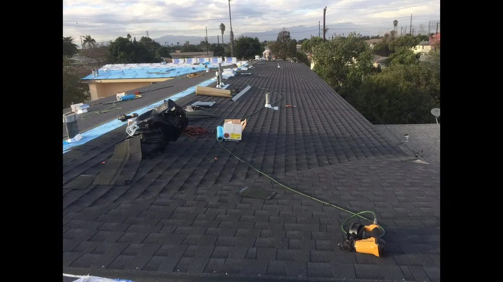 Slide of Ruiz Roofing Construction