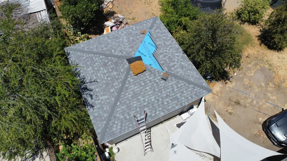 Slide of Ruiz Roofing