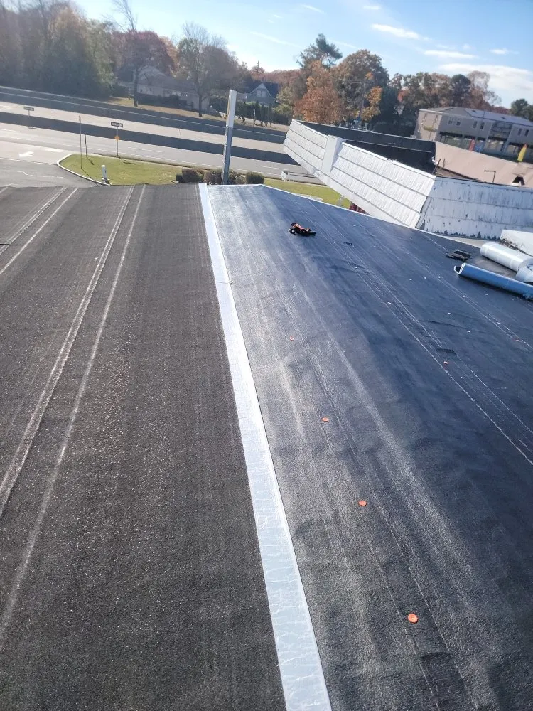 Slide of Ruiz Roofing Leak Ander