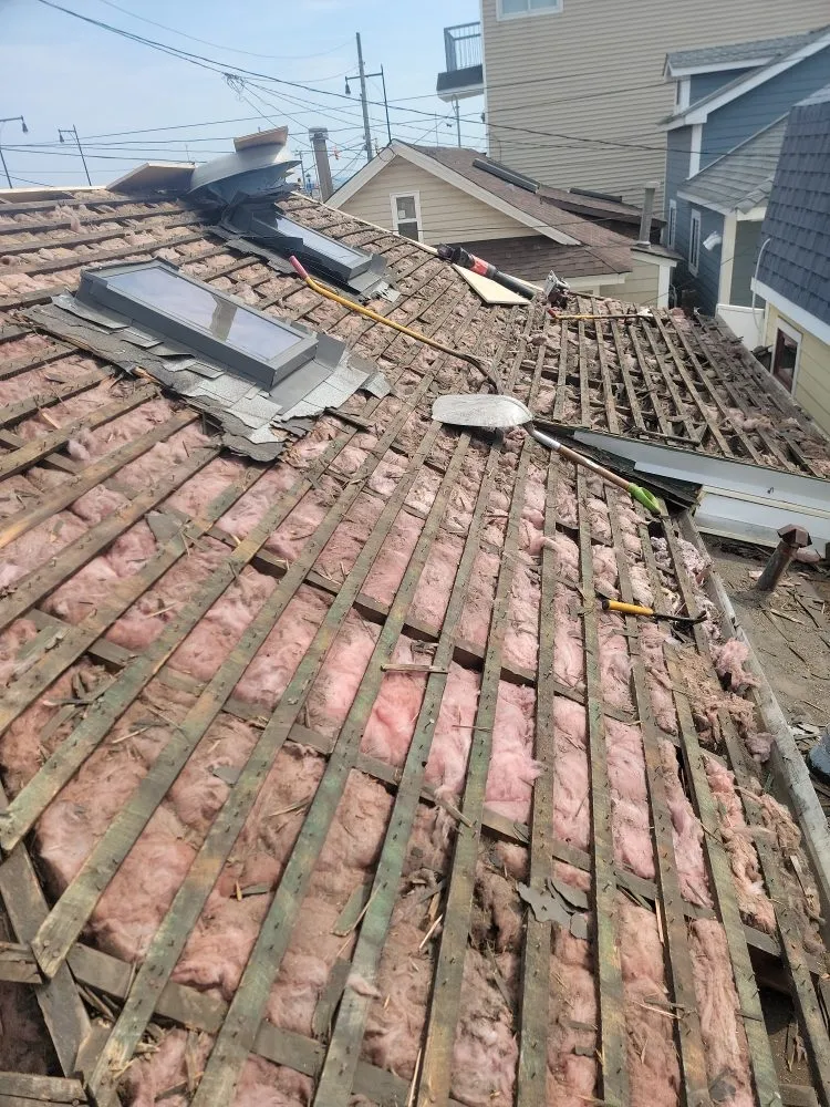 Slide of Ruiz Roofing Leak Ander