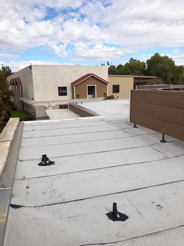 Slide of Ruiz Roofing