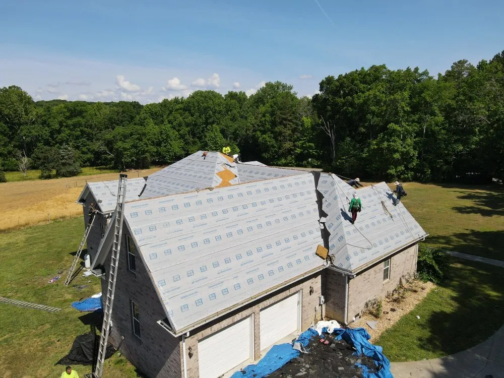 Slide of Rumble Bee Roofing