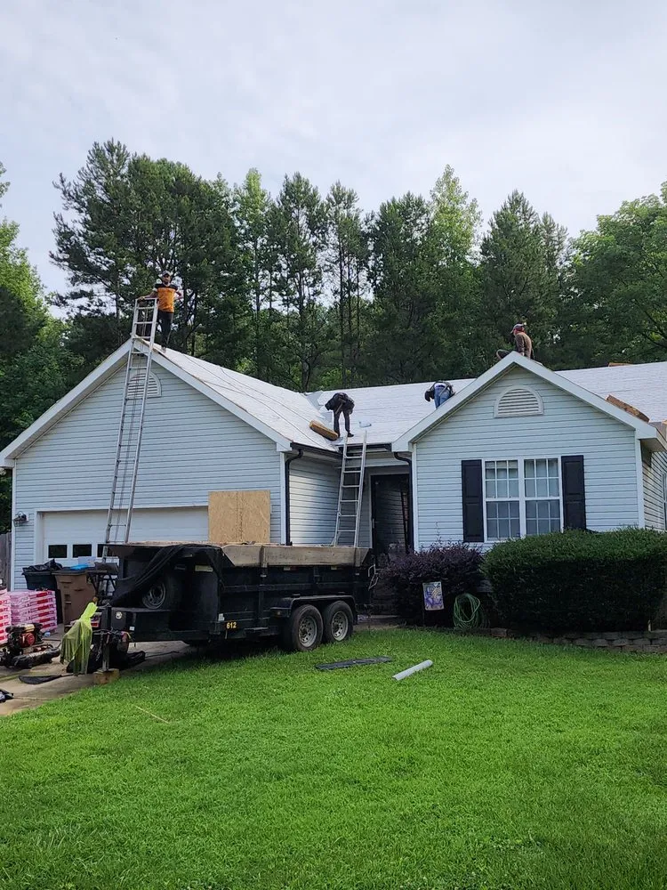 Slide of Rumble Bee Roofing