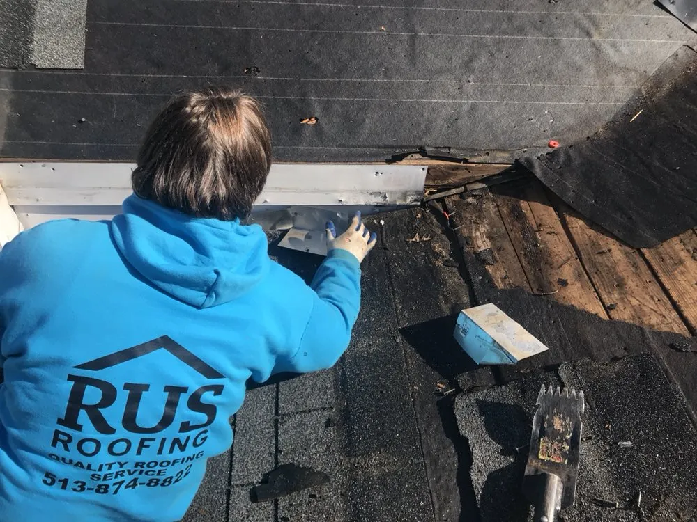 Slide of Rus Roofing