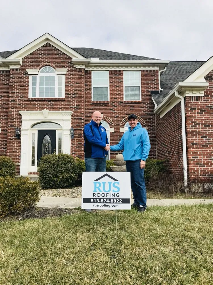 Slide of Rus Roofing