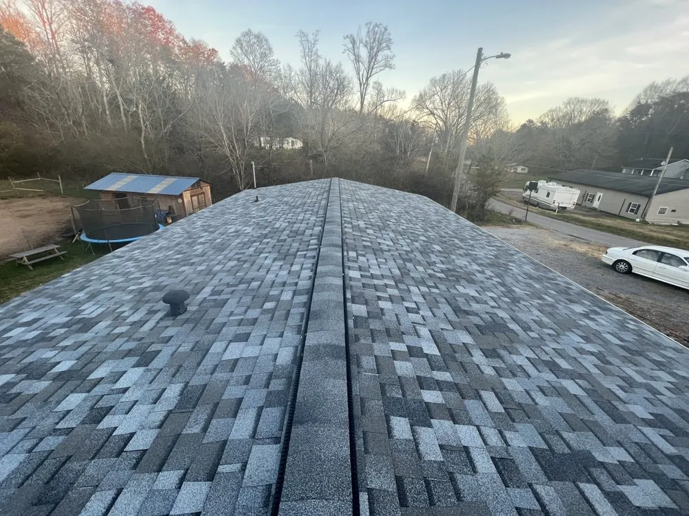 Slide of Russells Roofing Knoxville