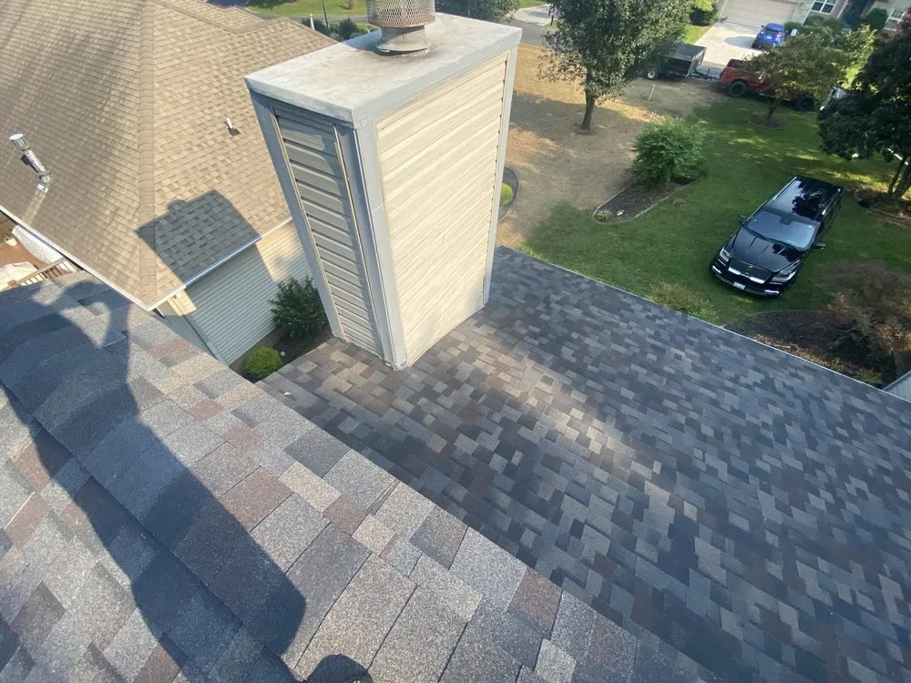 Slide of Russells Roofing Knoxville