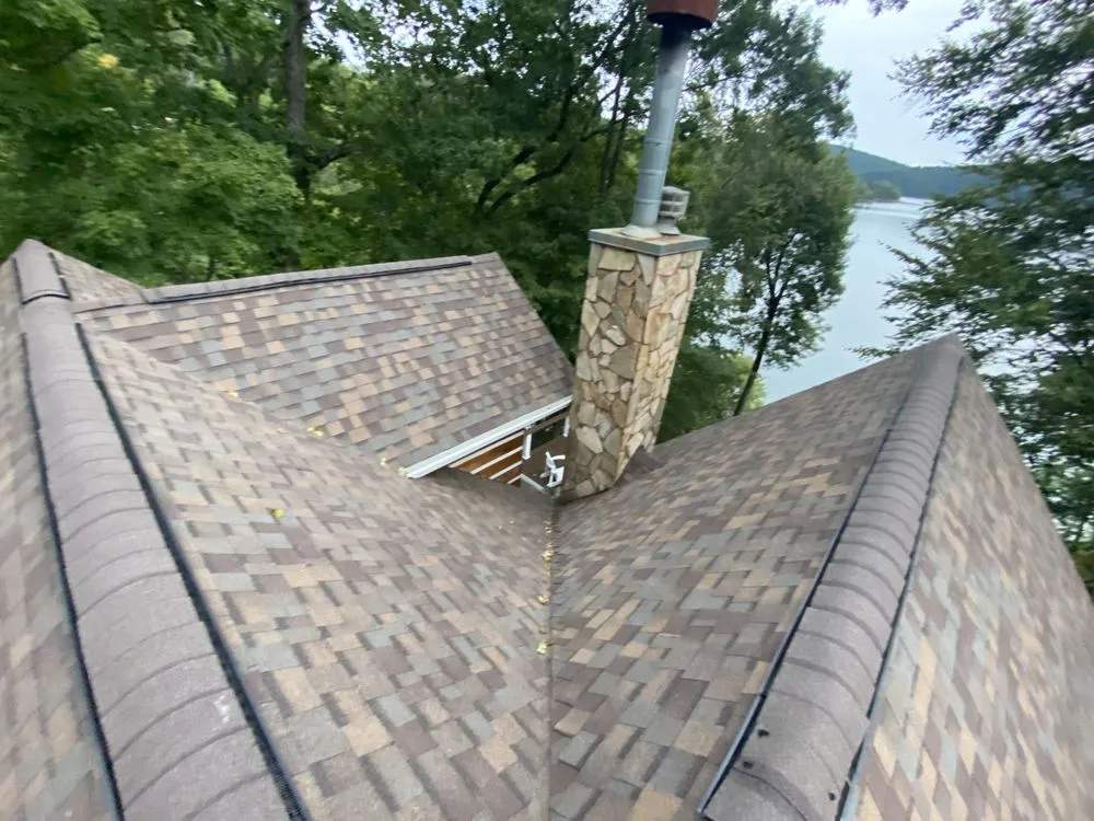 Slide of Russells Roofing Knoxville