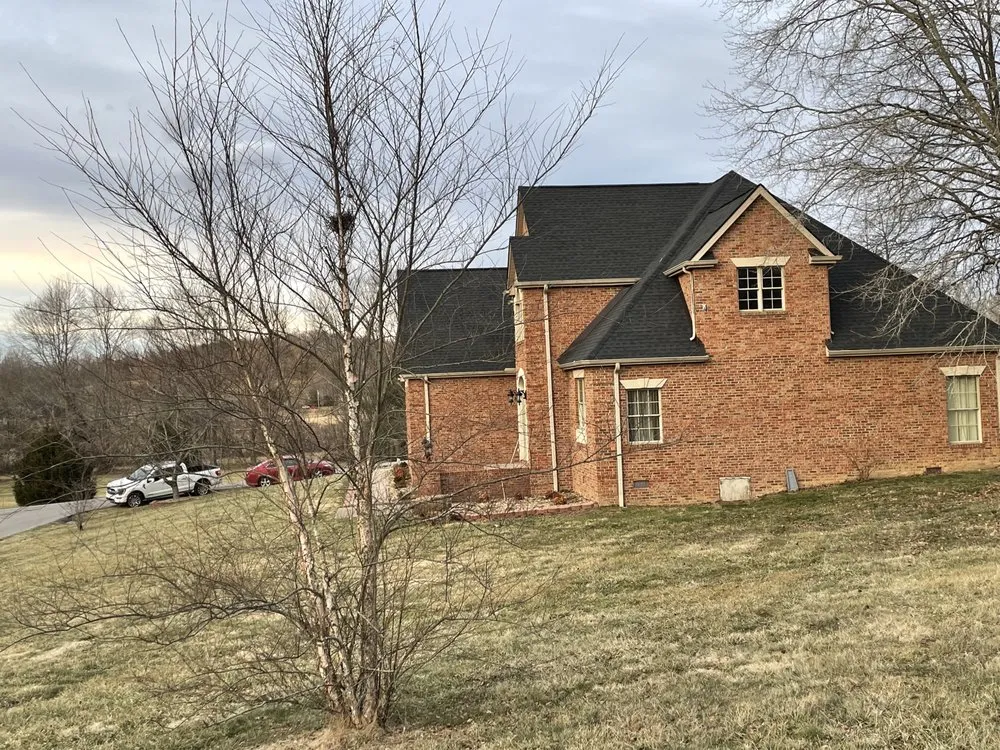 Slide of Russells Roofing Knoxville