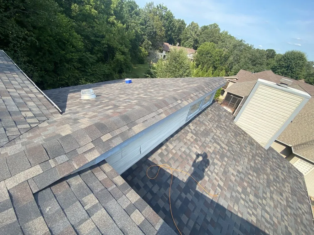 Slide of Russells Roofing Knoxville