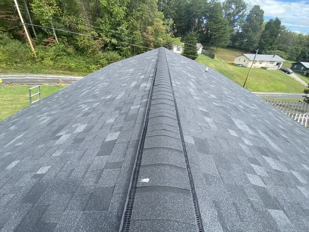 Slide of Russells Roofing Knoxville