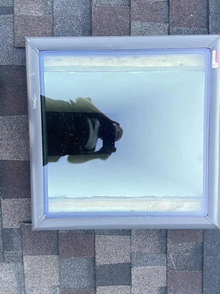 Slide of Russells Roofing Knoxville