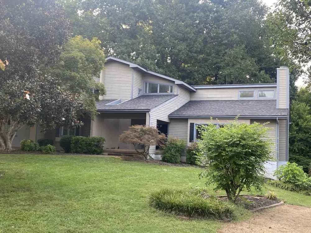 Slide of Russells Roofing Knoxville