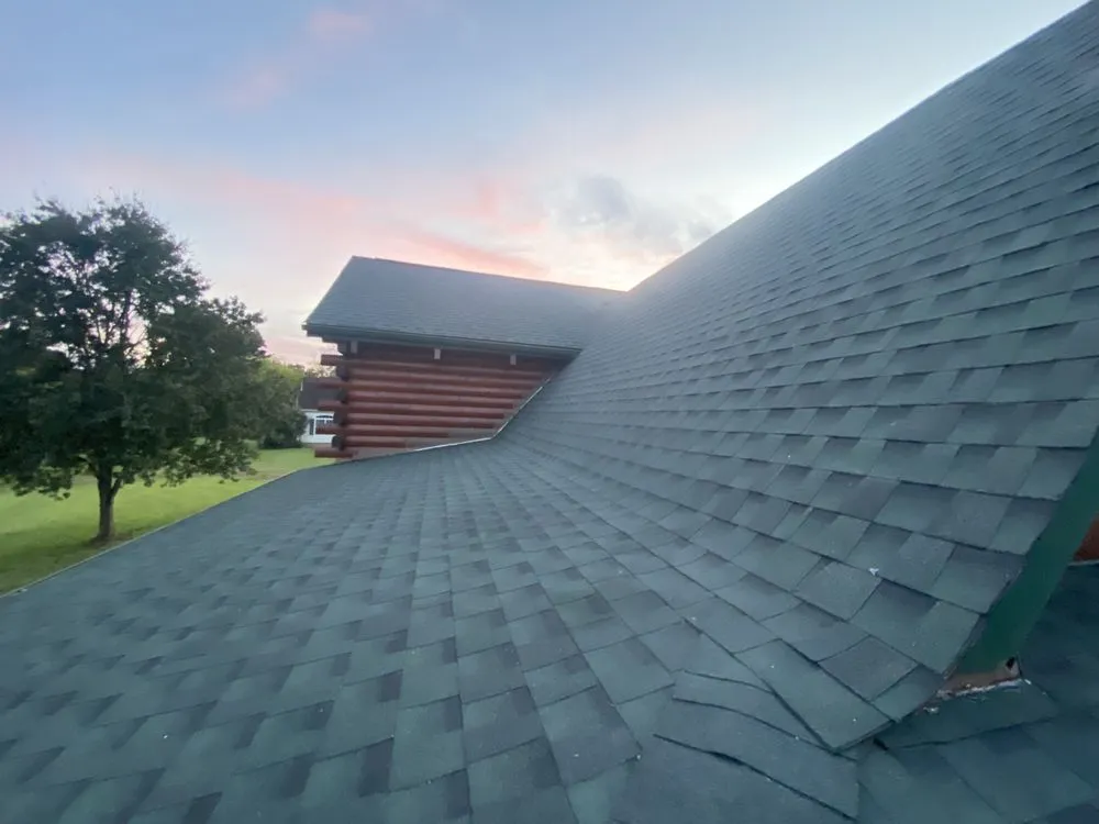 Slide of Russells Roofing Knoxville