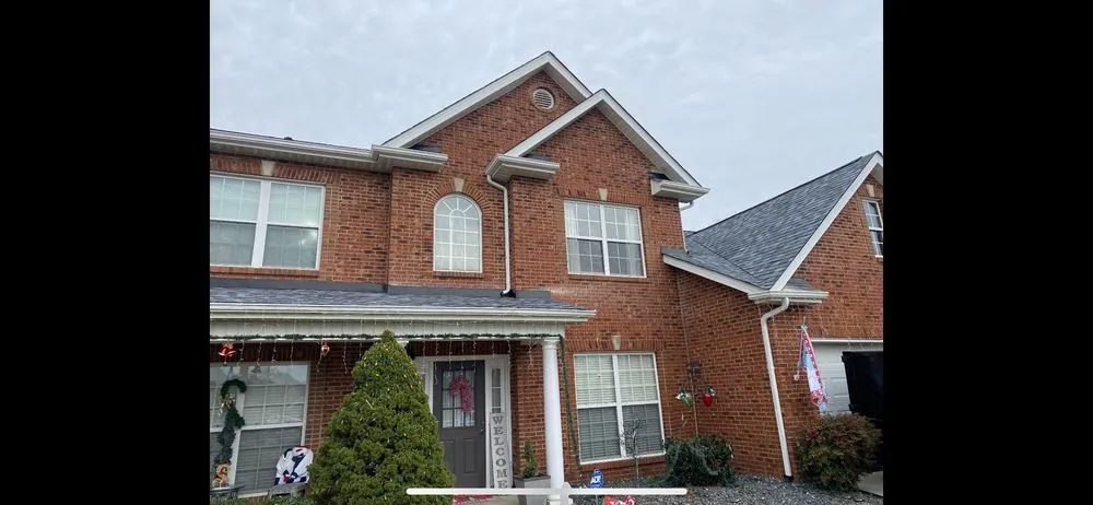 Slide of Russells Roofing Knoxville