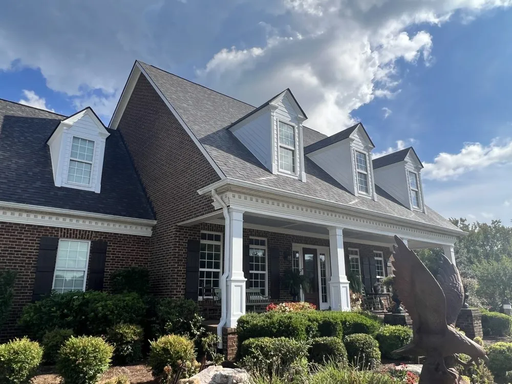 Slide of Russells Roofing Knoxville