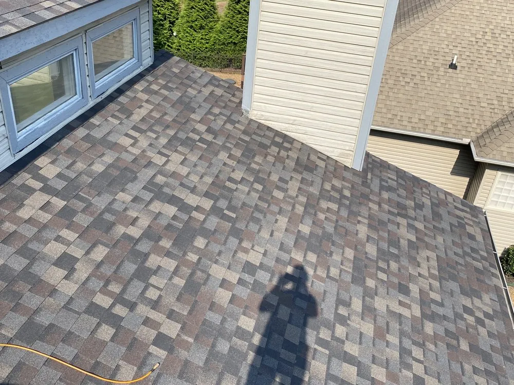 Slide of Russells Roofing Knoxville