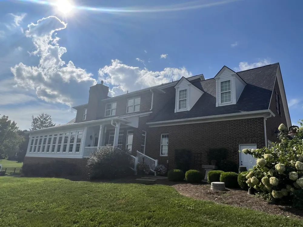 Slide of Russells Roofing Knoxville