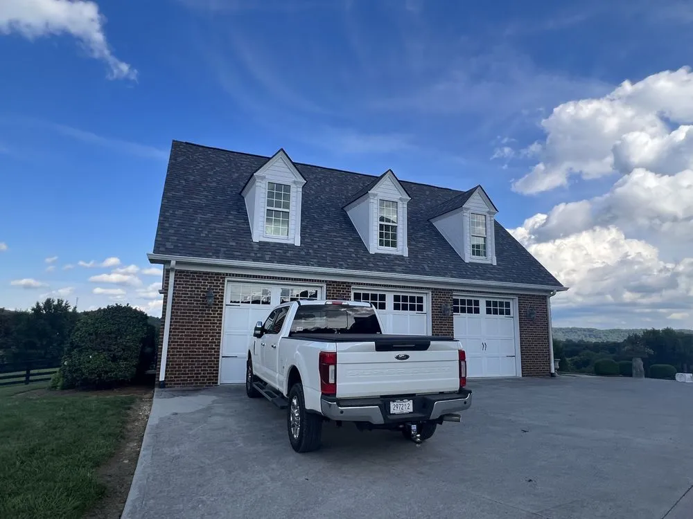 Slide of Russells Roofing Knoxville