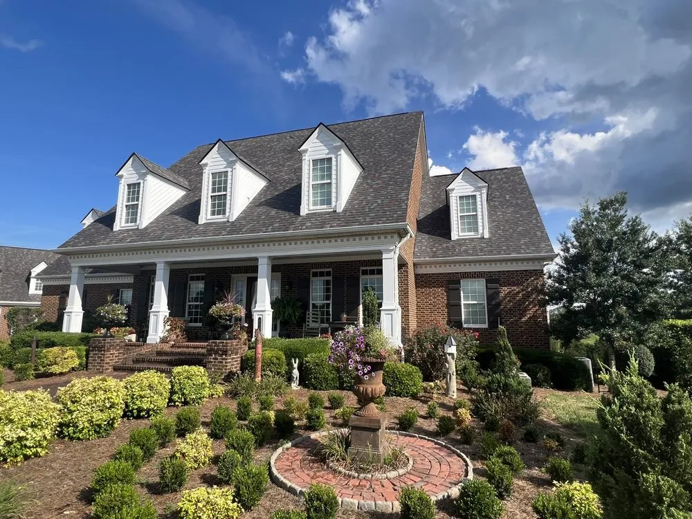 Slide of Russells Roofing Knoxville