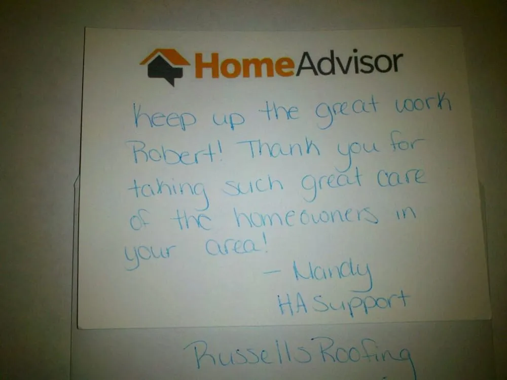 Slide of Russell's Roofing