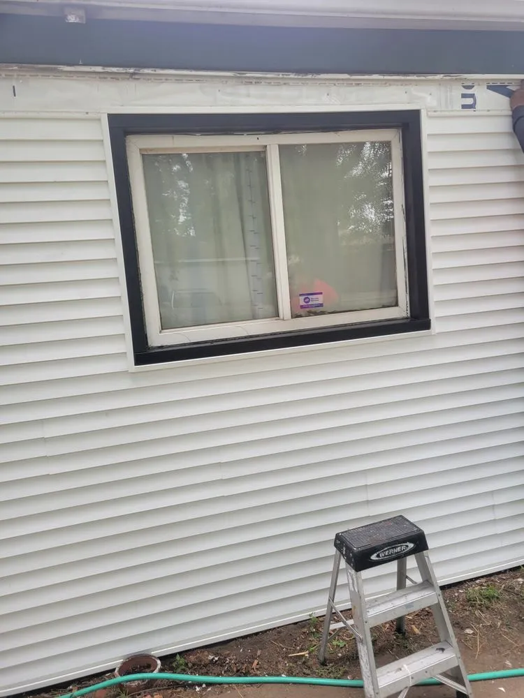 Slide of Ruzich Roofing