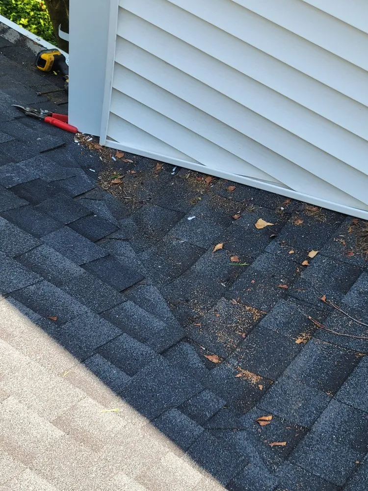 Slide of Ruzich Roofing