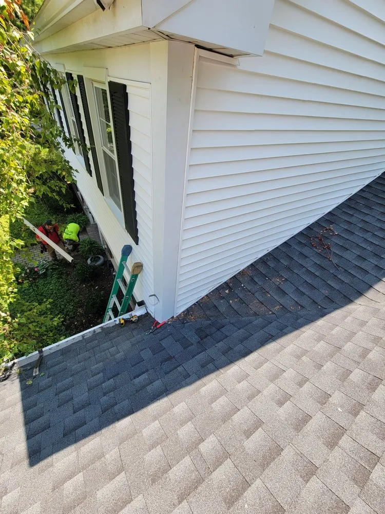 Slide of Ruzich Roofing