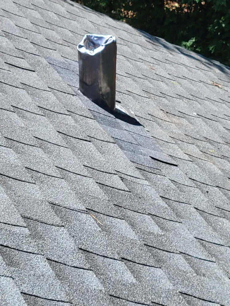 Slide of Ruzich Roofing