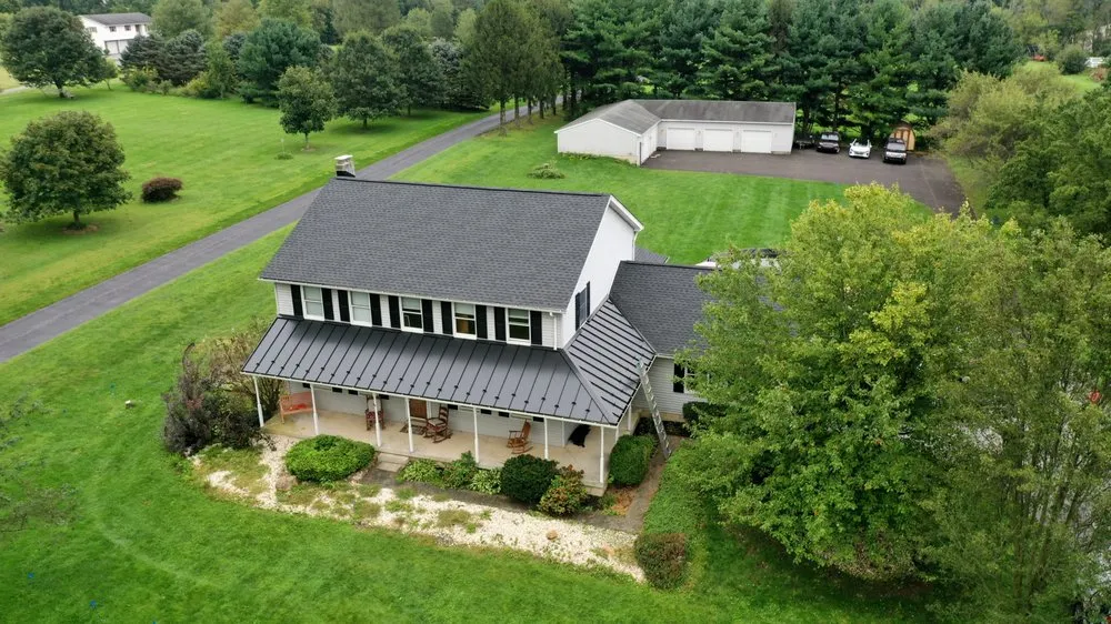 Licensed storm damage roof repair in Hazle Township, PA by RWB Roofing & Construction