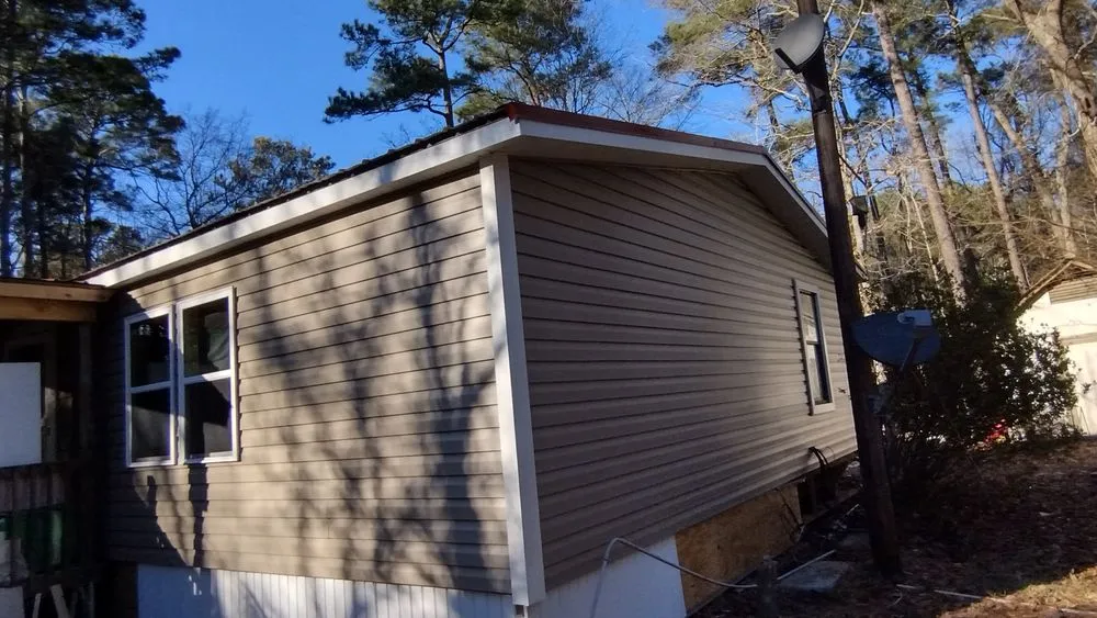 Slide of Ryan's Roofing and Home Services