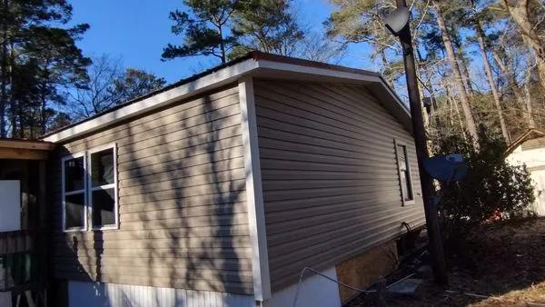 Ryan's Roofing and Home Services Logo