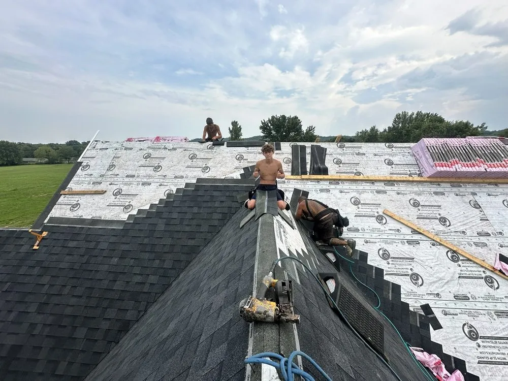 Slide of Ryan’Z Roof’Z and Extior’Z