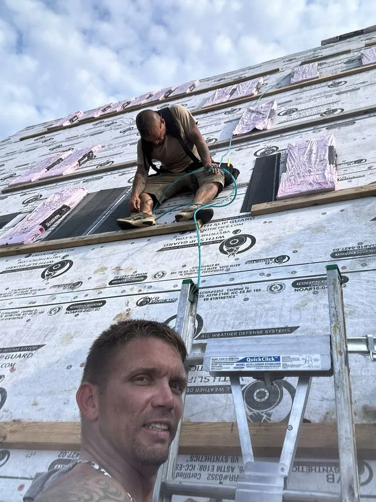 Slide of Ryan’Z Roof’Z and Extior’Z