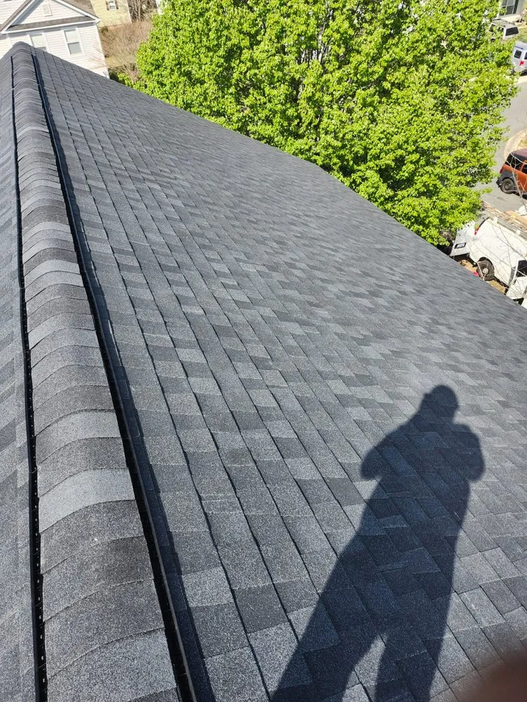 Slide of RYC Roofing Construction