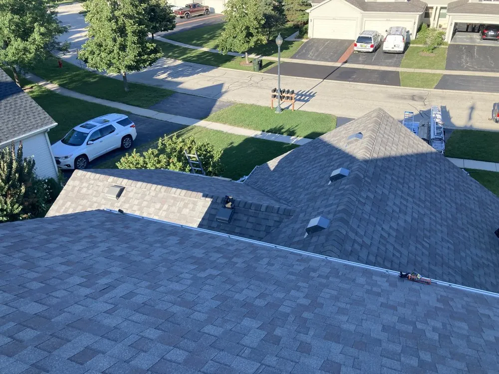 Slide of RZG Roofing Siding and Gutters