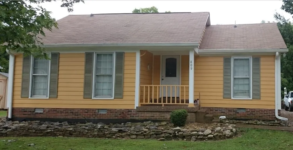 Slide of S & D Roofing