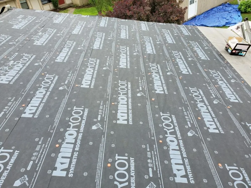 Slide of S & J Roofing