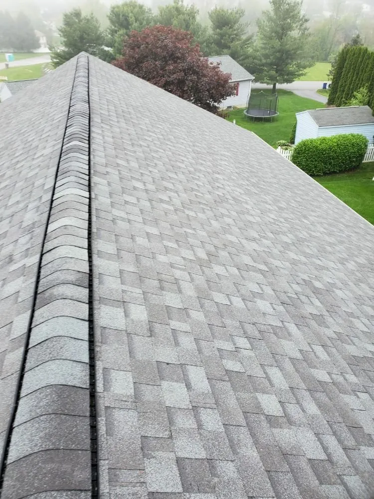 Slide of S & J Roofing